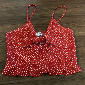 RED TANK TOP WITH WHITE DETAILS AND A BOW IN FRONT